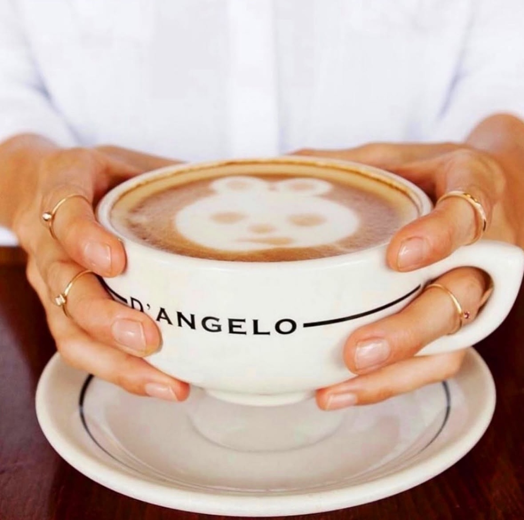 Handcrafted panda bear latte art in big ceramic D'Angelo mug